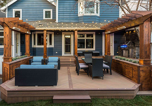 Deck design with firepit, outdoor kitchen and covered roof.